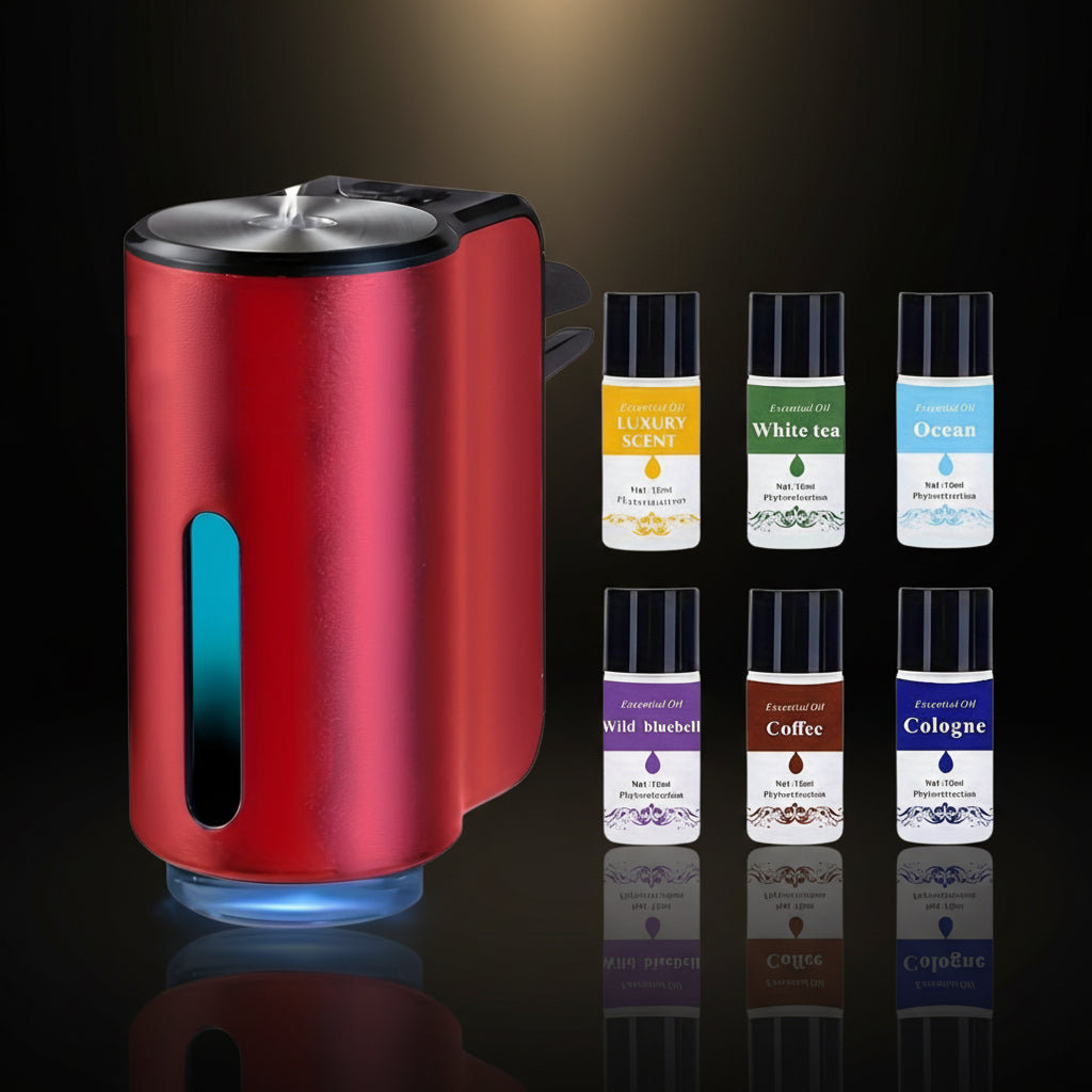 Red candle warmer with six essential oil bottles on a white background