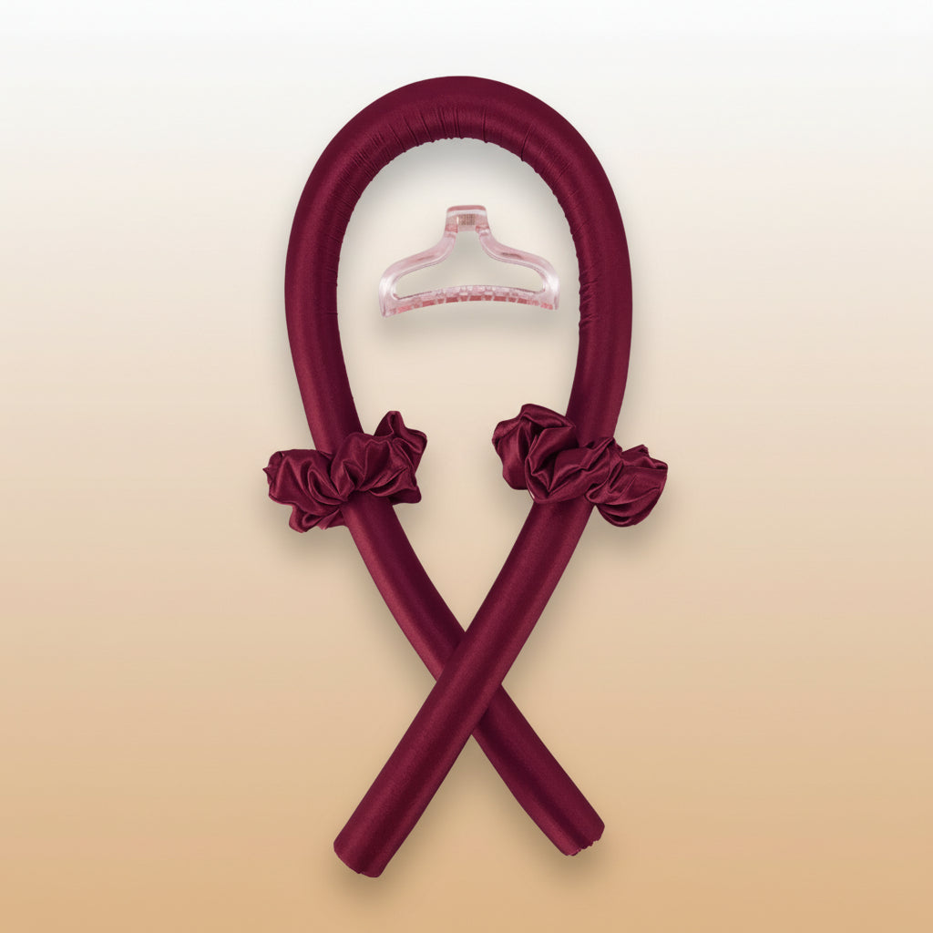 Two maroon hangers with floral attachments on a white background