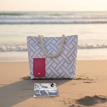 Gray geometric patterned tote bag with pink pocket and small pouch on a white background