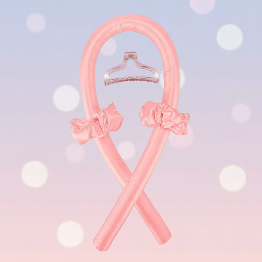 Pink hangers with decorative bows on a white background