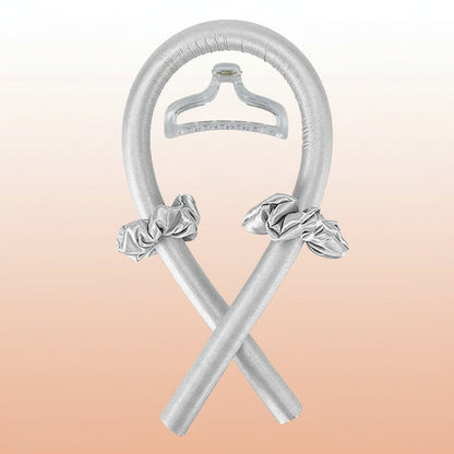 Silver hangers with ribbons on a white background