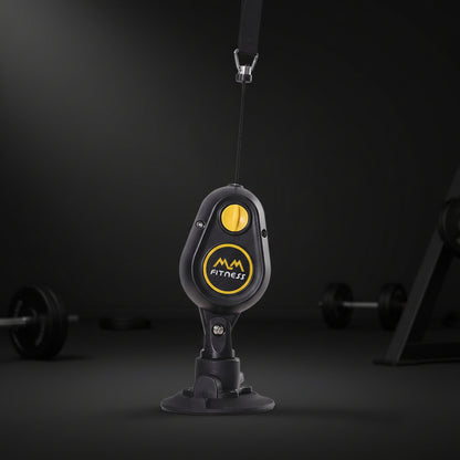 Black and yellow MM Fitness device on a white background