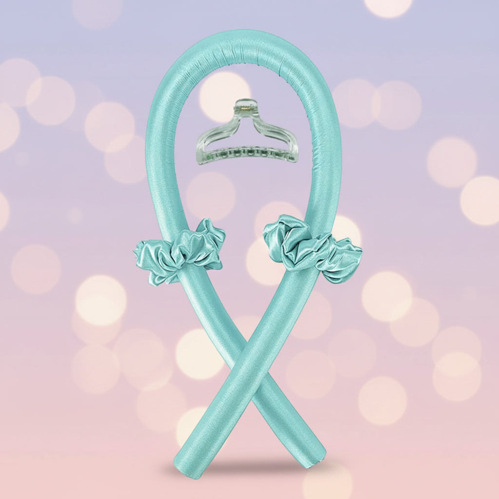 Turquoise hair ties with ruched ends and a silver clip on a white background