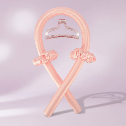 Pink inflatable hangers with bow decorations on a white background