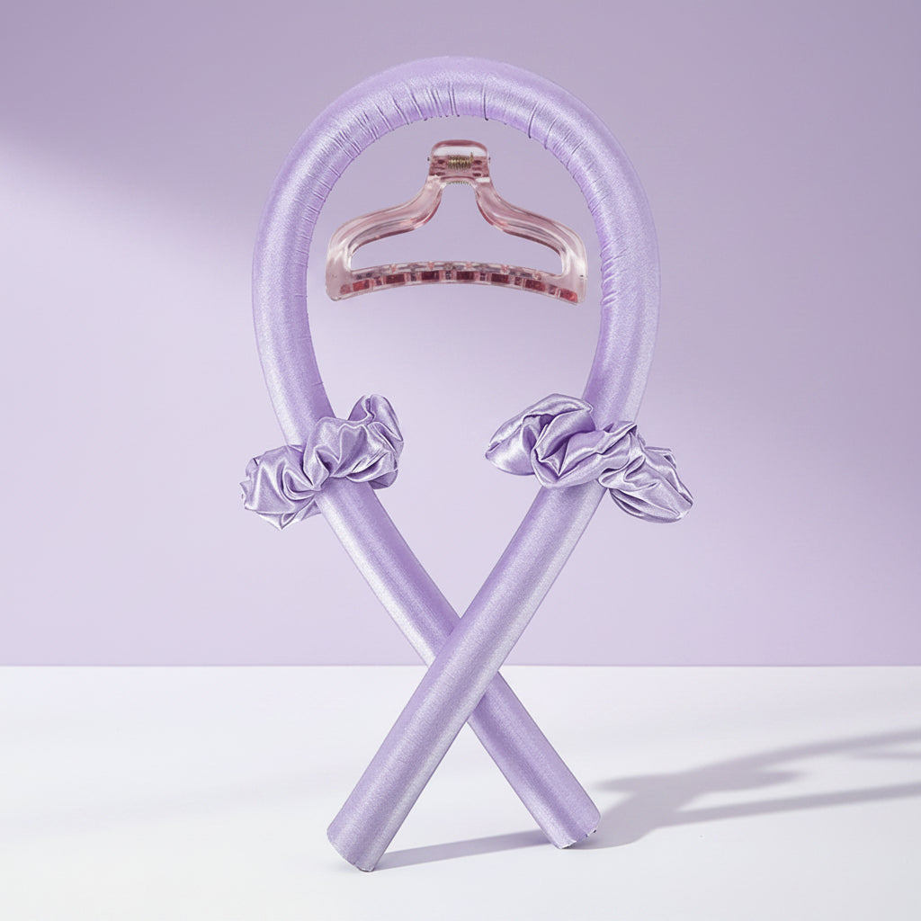 Purple hanger with decorative bows on a white background