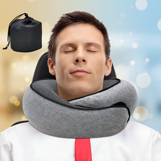 Man using a gray travel neck pillow with a black carrying case on a white background