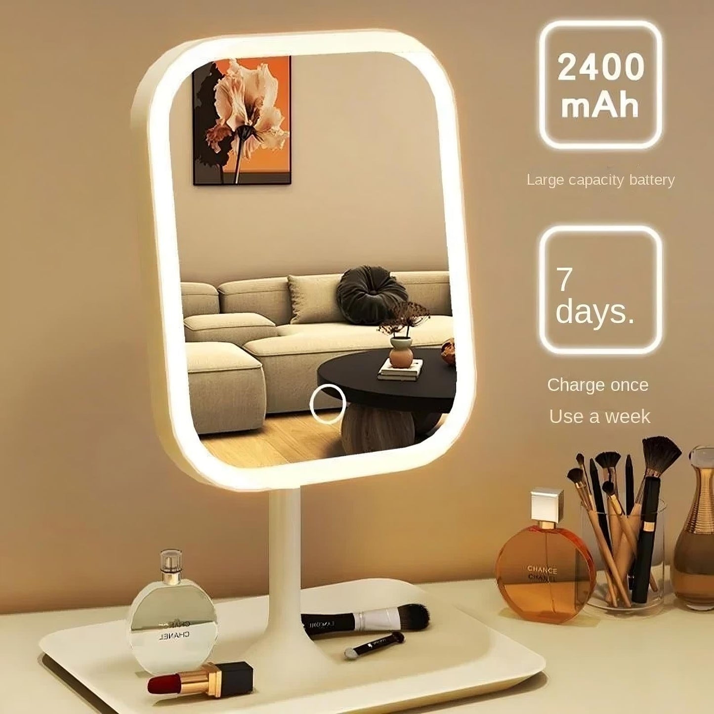 Lighted makeup mirror with battery information on a table with beauty products.