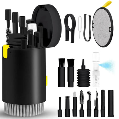 Collection of cleaning tools and accessories in a black container on a white background