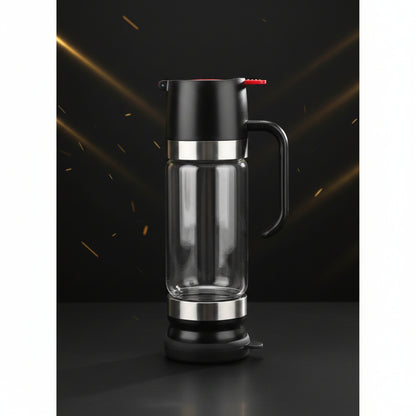 Clear glass water bottle with black and red lid on a white background