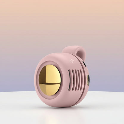 Pink handheld mirror with gold interior on a white background
