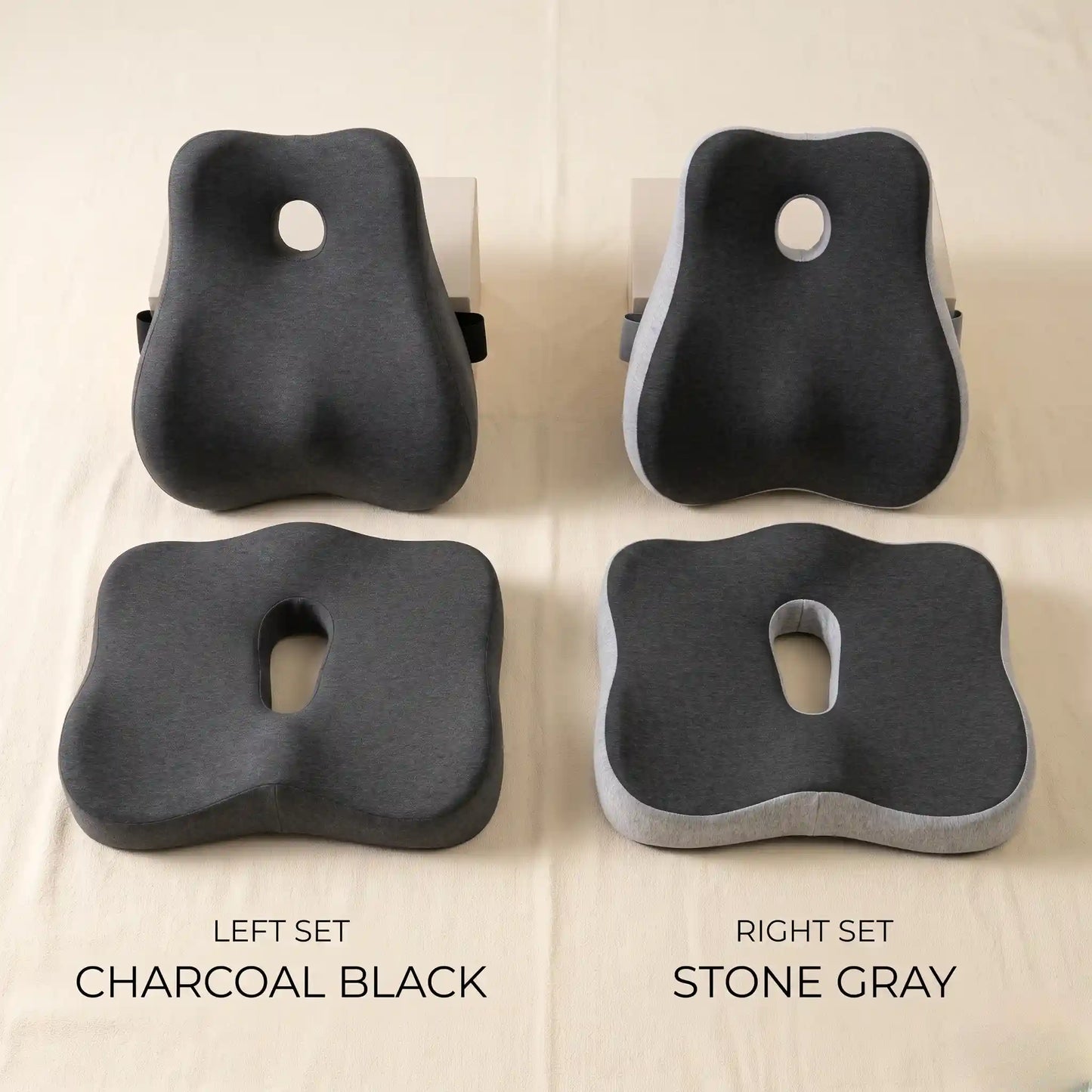 Two pairs of black and stone gray seat cushions on a beige background.